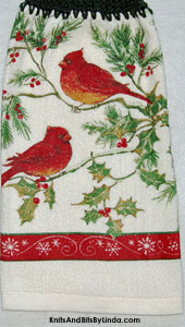 pair of cardinals on holly and pine branches hanging kitchen hand towel