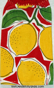big lemons on red background hand towel