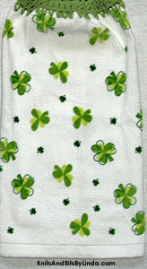 large and small shamrocks on hanging kitchen towel for st patrick's day