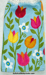 spring tulips on blue background towel