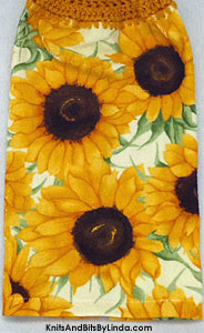 sunflowers on kitchen towel with pale yellow background