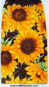 sunflowers on a dark brown background terry towel