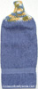 Island Blue yarn top on a medium blue hand towel