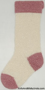 Aran knitted Christmas stocking with Golden Rose yarn cuff, heel and toe with gold shiny metallic thread