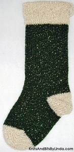 Balsam Green acrylic metallic yarn Christmas stocking with Aran yarn cuff, heel and toe with gold shiny metallic thread