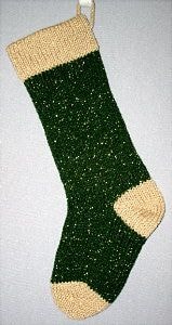 Balsam Green knitted Christmas stocking with tea-dye lace yarn cuff, heel and toe with gold shiny metallic thread