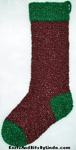 Burgundy Jewels knitted Christmas stocking with Green Jewels cuff, heel and toe with gold shiny thread
