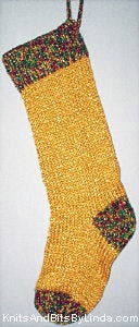 Gold Jewels knitted Christmas stocking with Multi 1 gold burgundy green cuff with gold shiny thread