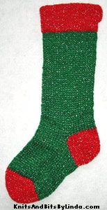 Traditional Christmas Green 2 knitted sparkle stocking with red cuff, heel and toe with silver thread
