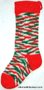 Traditional Multi 1 knitted sparkle Christmas stocking with red cuff, heel and toe with silver thread