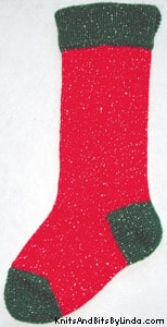 Traditional Red sparkle Christmas stocking with green cuff, heel and toe with silver thread