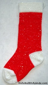 Traditional Christmas Red 1 knitted sparkle stocking with white cuff, heel and toe with silver thread