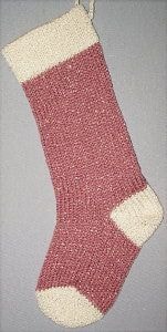 Golden Rose knitted Christmas stocking with Ivory yarn cuff, heel and toe with gold shiny metallic thread