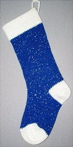 Royal Blue knitted Christmas stocking with Christmas White yarn cuff, heel and toe with silver shiny metallic thread