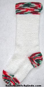Traditional White knitted sparkle Christmas stocking with multi-color red, white and green silver thread trim