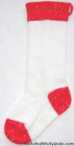 Traditional White 1 knitted sparkle Christmas stocking with red cuff, heel and toe with silver thread