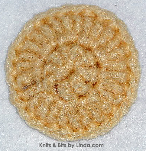 round beige scrubbie