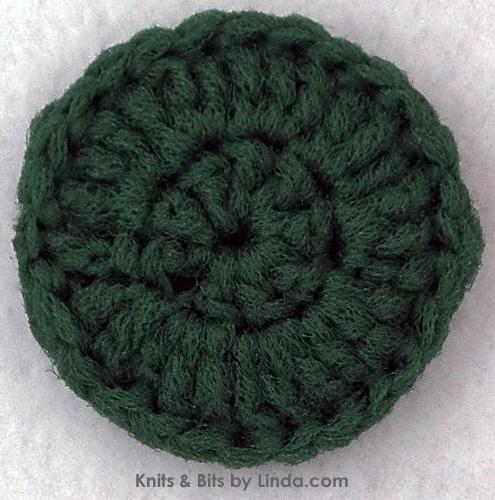 emerald green round scrubbie