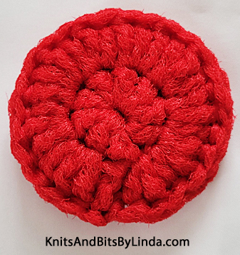 red round 3 inch scrubbie